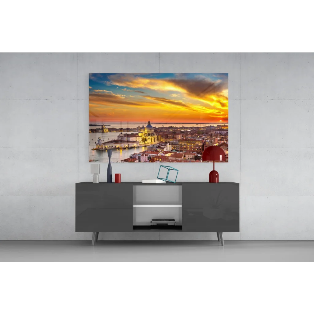Vibrant sunset glass wall art print over cityscape and water
