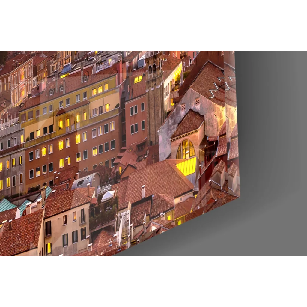 Cozy European cityscape glass wall art print in frame at dusk