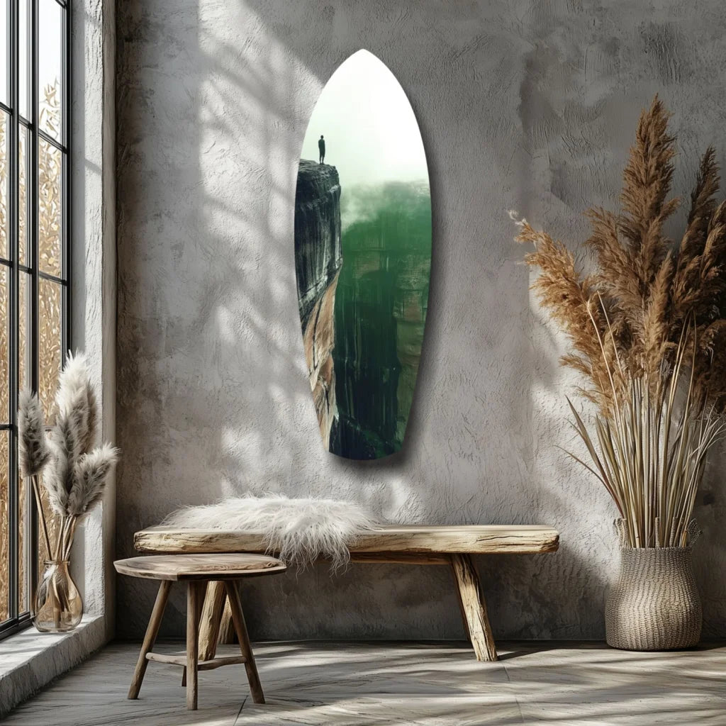 Surfboard tempered glass art with cliffside print on gray wall
