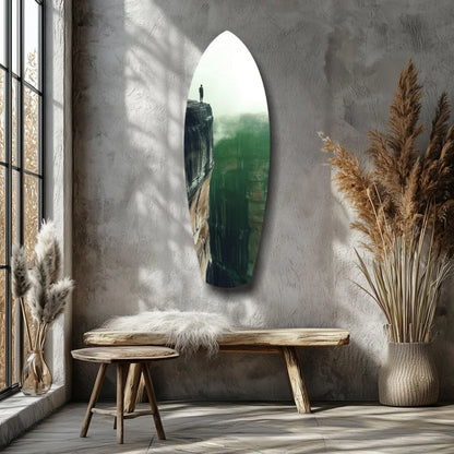 Surfboard tempered glass art with cliffside print on gray wall
