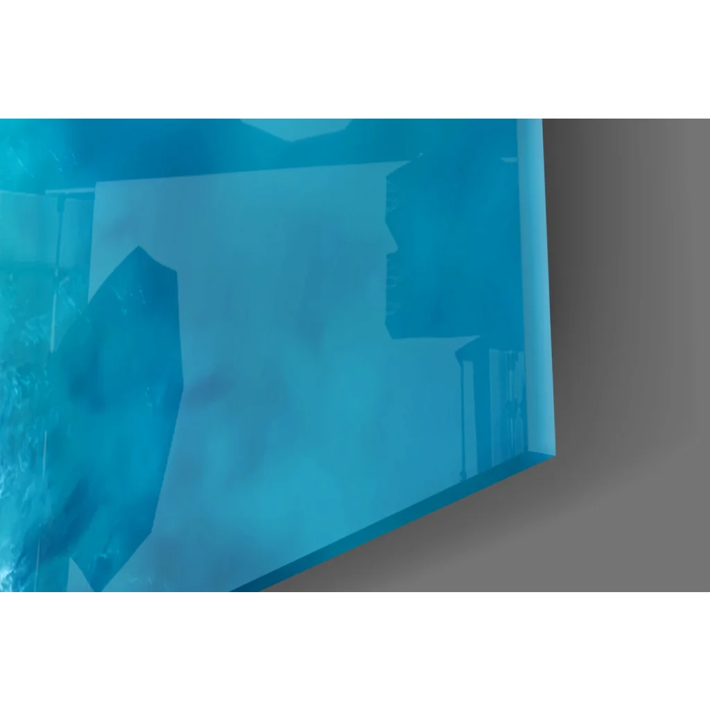 Translucent blue glass wall art with ocean wave design