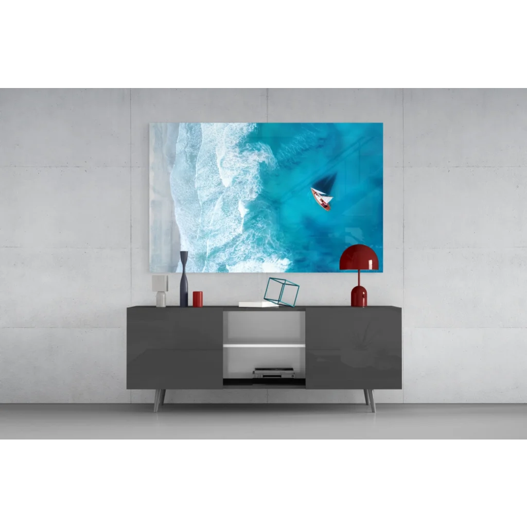 Sleek dark gray minimalist console table with open shelving and wall art