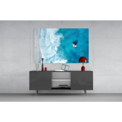 Sleek dark gray minimalist console table with open shelving and wall art