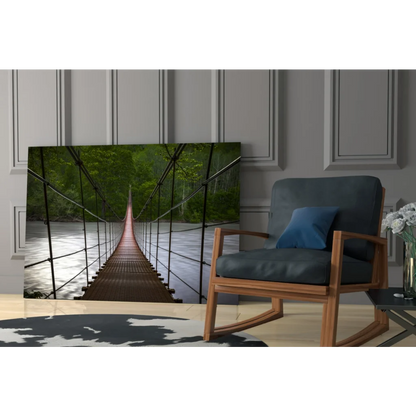Dark blue rocking chair with wooden frame under suspended bridge wall art
