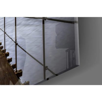 Sleek glass wall art of suspended bridge with lush forest views