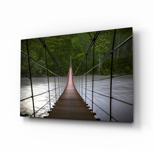 Suspended bridge wall art canvas print with lush forest views