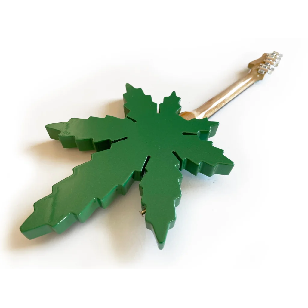 Green marijuana leaf keychain on axe heaven® guitar model