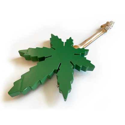 Green marijuana leaf keychain on axe heaven® guitar model