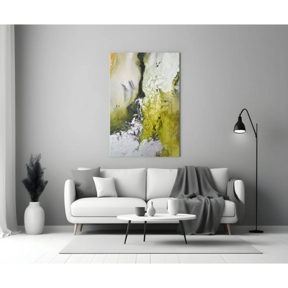 Swirling yellow green white glass wall art above modern sofa