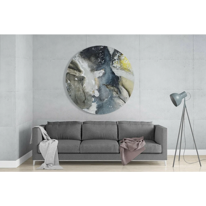 Swirling abstract tempered glass art circle on concrete wall