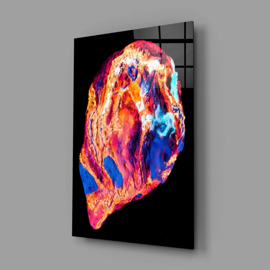Vibrant swirling cosmos glass wall art in neon orange, pink, blue, purple hues