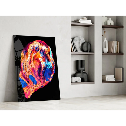 Vibrant swirling cosmos glass wall art in neon orange, red, blue, pink hues