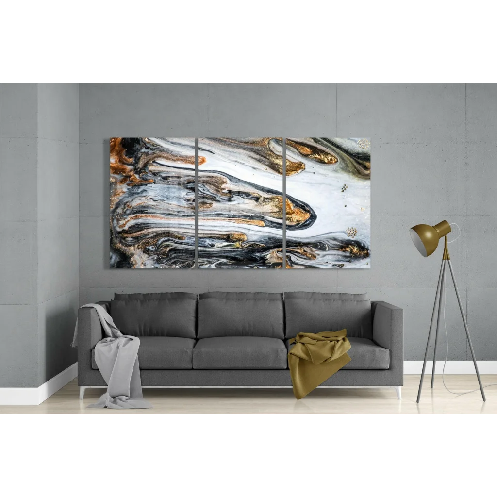 Swirling gold black white glass wall art triptych with abstract patterns