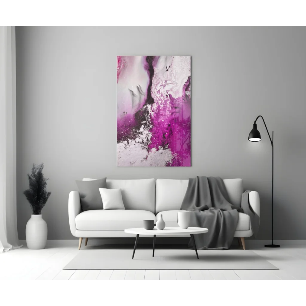 Swirling magenta glass wall art with glossy abstract design above sofa