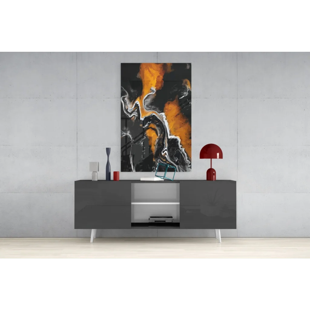 Swirling orange black white glass wall art energy explosion above gray console