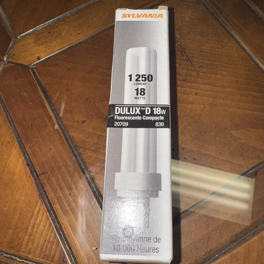 Sylvania CF18DD 18W compact fluorescent light bulb in packaging