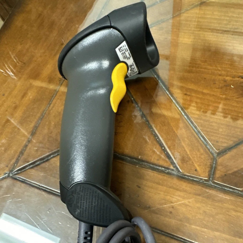 Black and yellow Symbol Motorola LS2208 handheld barcode scanner with textured grip