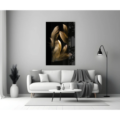Modern black-and-gold glass wall art above white sofa on gray wall