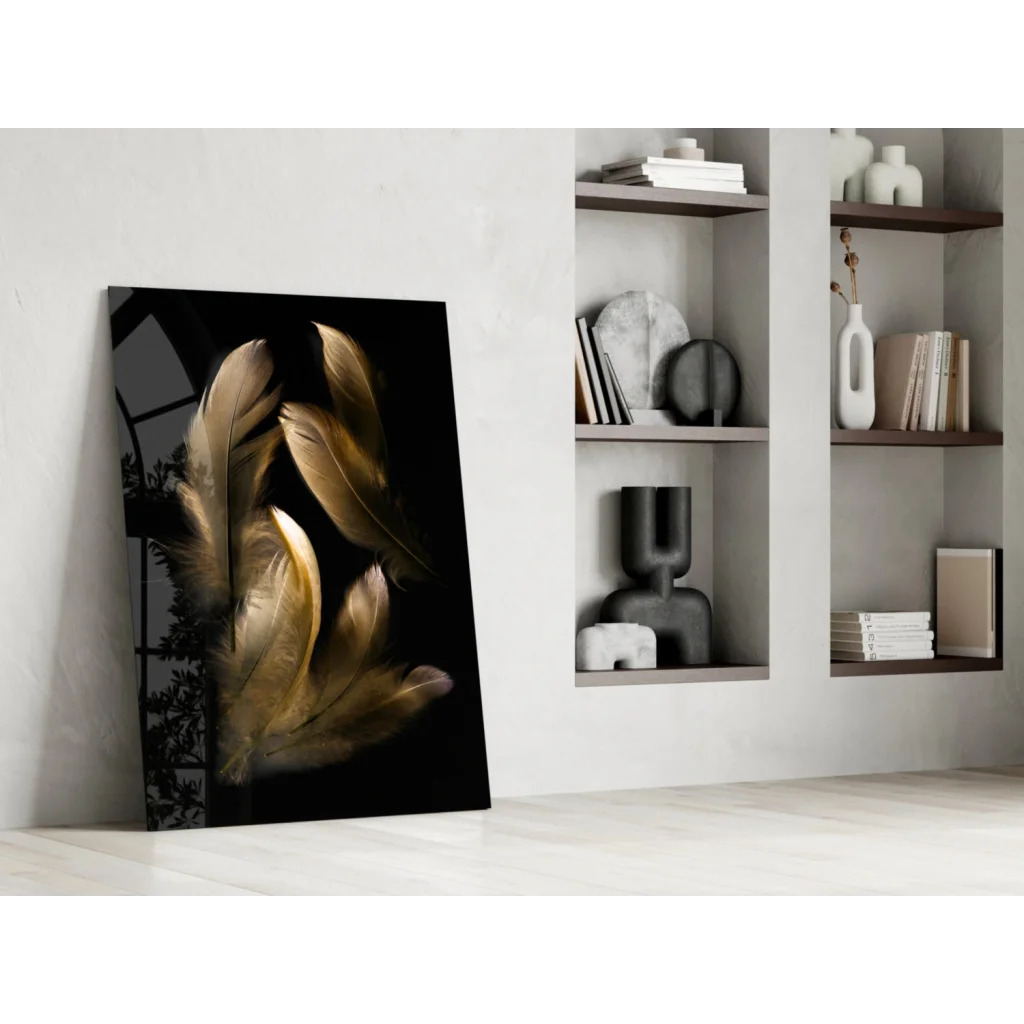 Sleek black canvas glass wall art with golden feathers and soft lighting