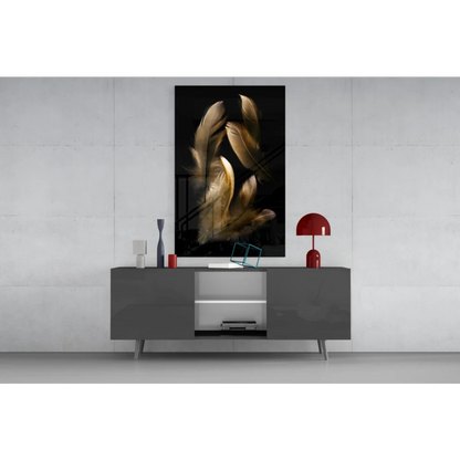 Stunning black-and-gold glass wall art feather above gray console