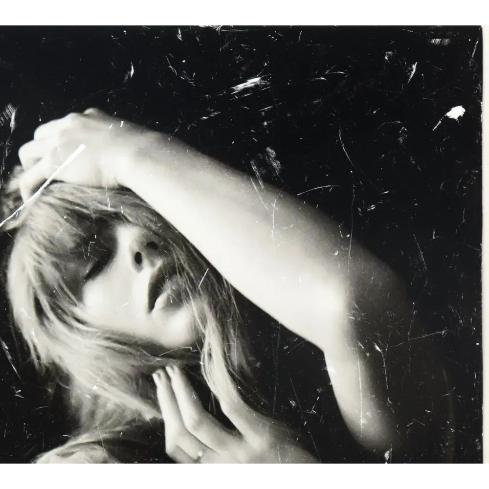 Black and white Taylor Swift Poets Department signed CD display photo of woman with closed eyes