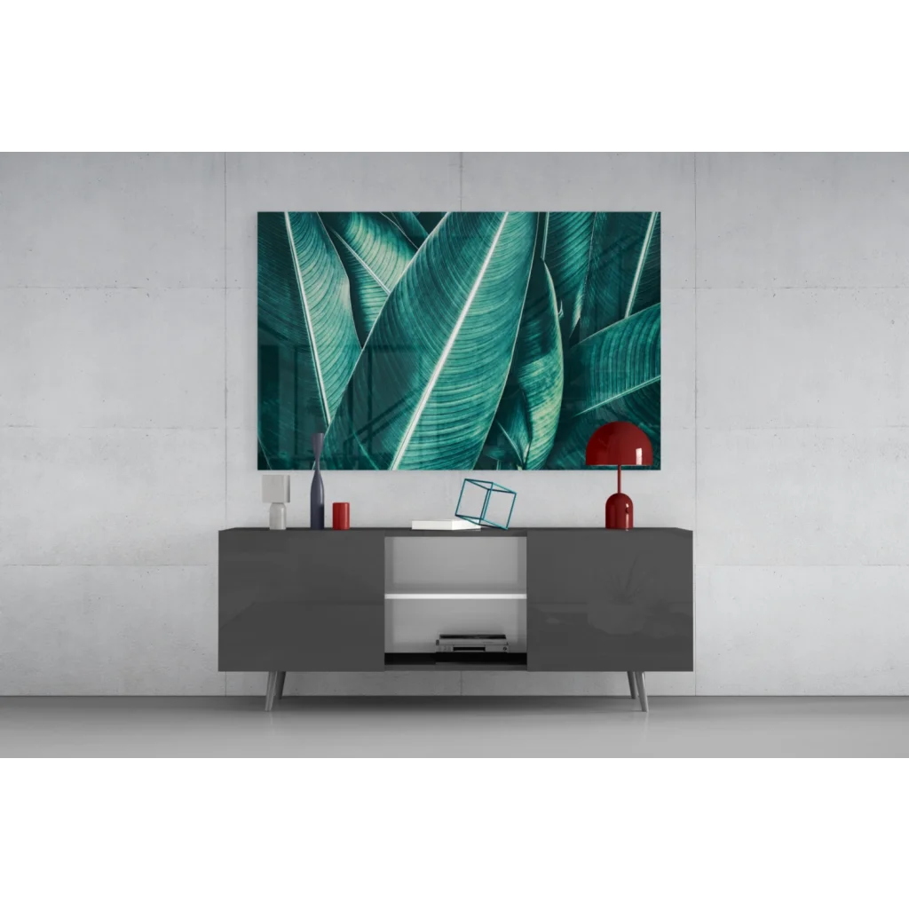 Teal banana leaf wall art canvas print on gray console