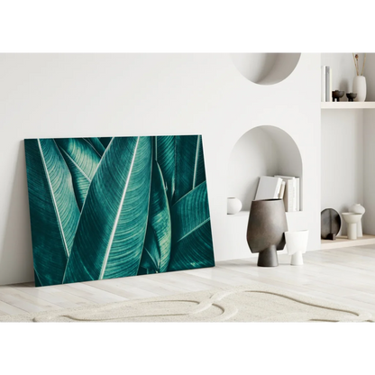 Vibrant teal banana leaf wall art canvas print with bold green foliage
