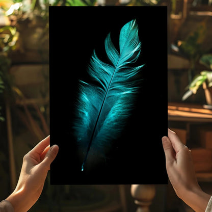 Stunning teal feather insigne aluminum print on black canvas held by hands