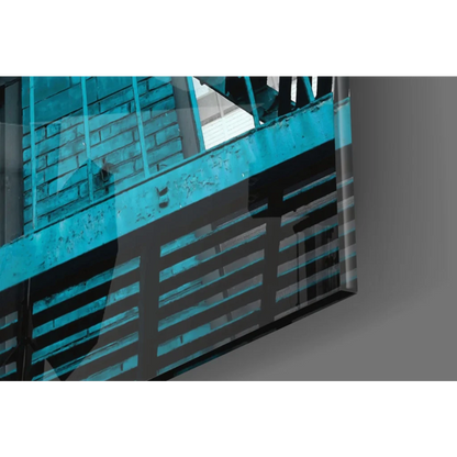 Teal fire escape staircase glass wall art with urban brick and railings