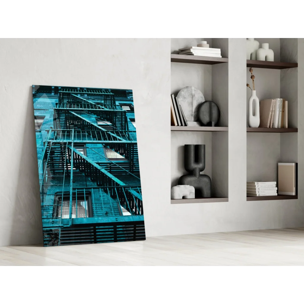 Vibrant teal fire escape wall art print leaning against white wall