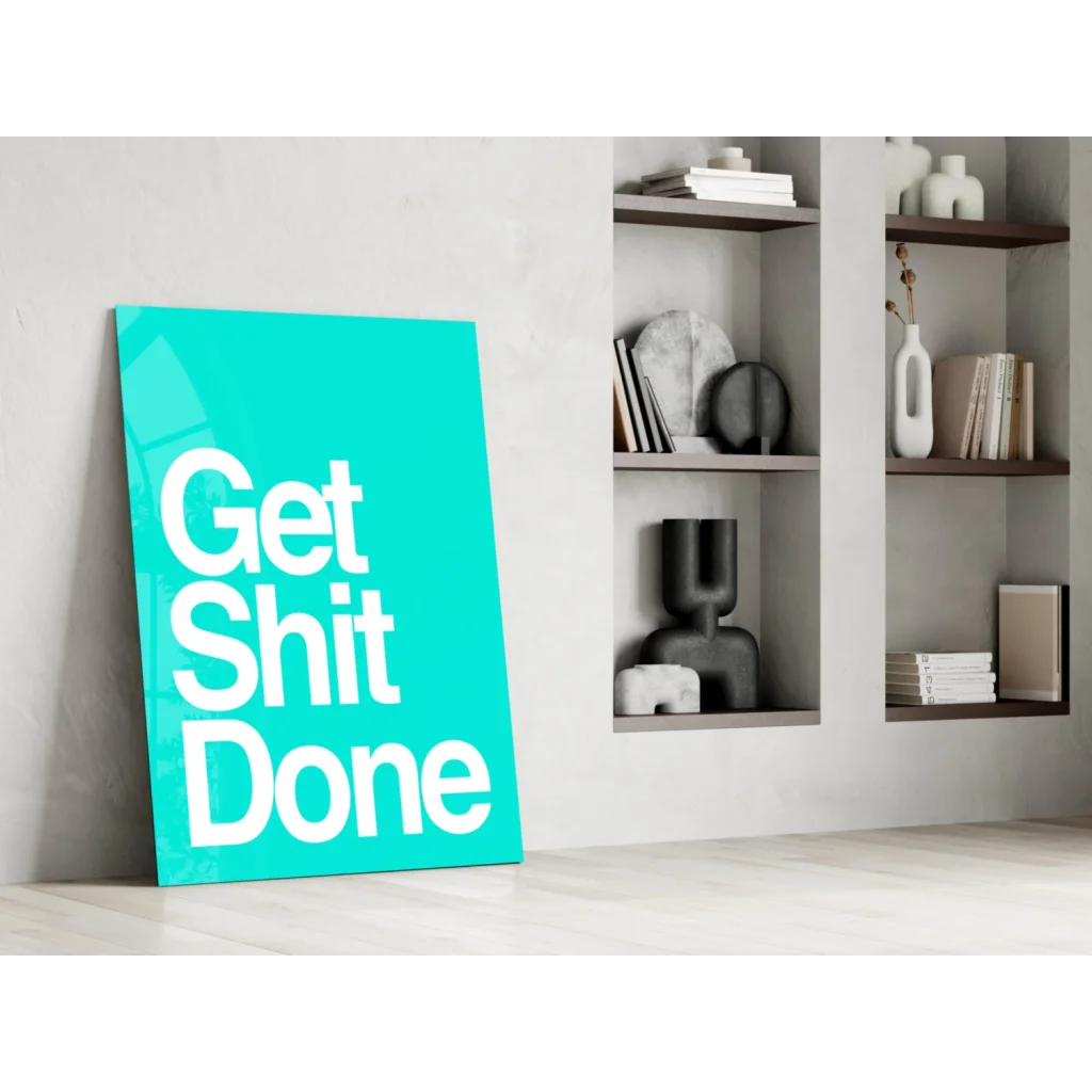 Teal get shit done glass wall art motivational poster on wooden shelf