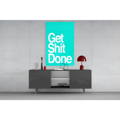 Teal Get Shit Done glass wall art with gray sideboard and red accents