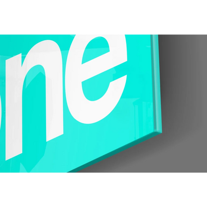 Teal glossy ne logo on motivational Get Shit Done glass wall art