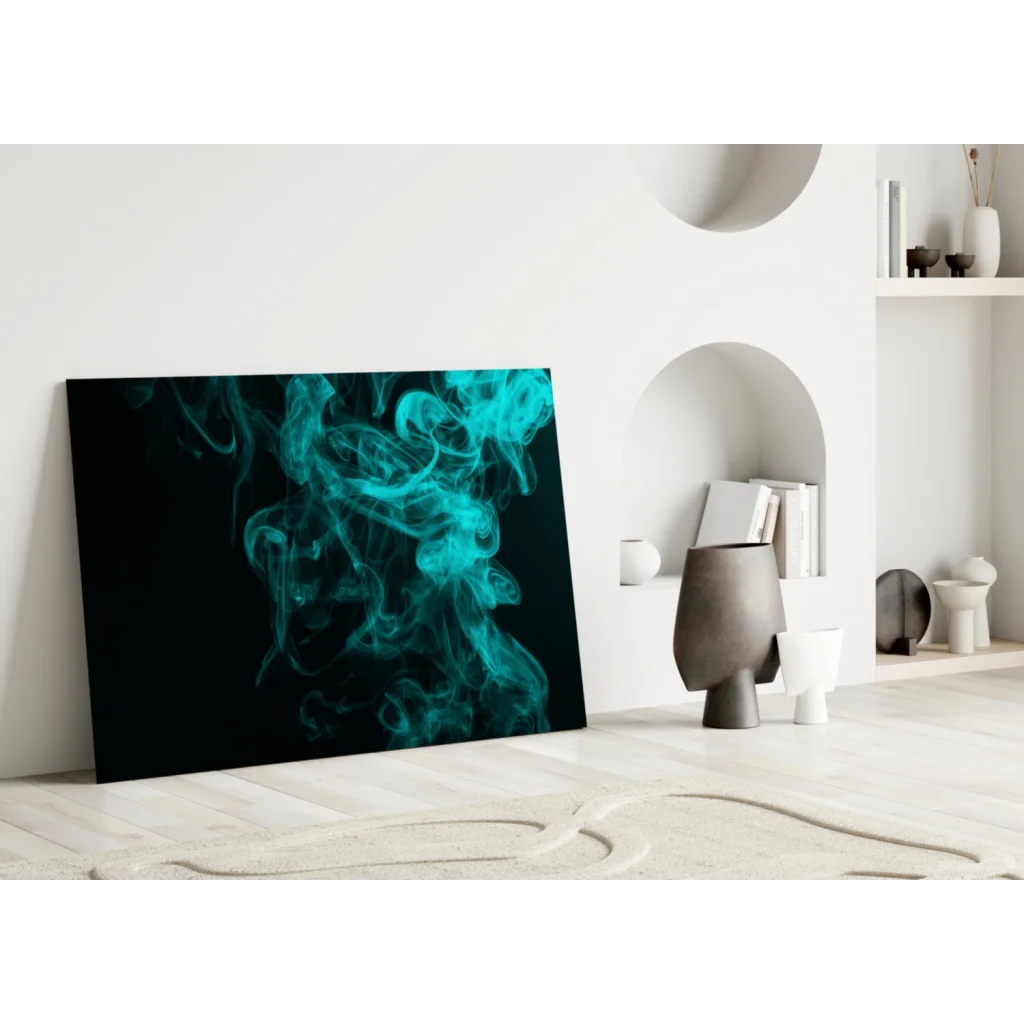 Teal smoke canvas wall art swirling on black background against white wall