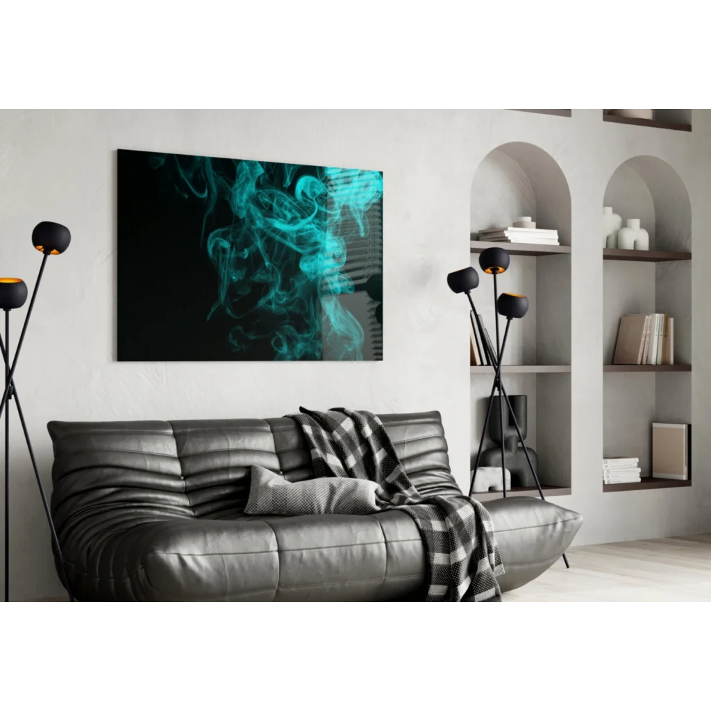 Sleek black leather sofa with plaid throw and Teal Smoke wall art