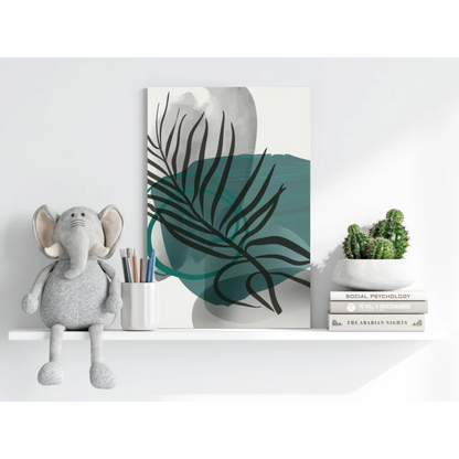Cute gray and white elephant plush toy on shelf with teal tropical leaf art
