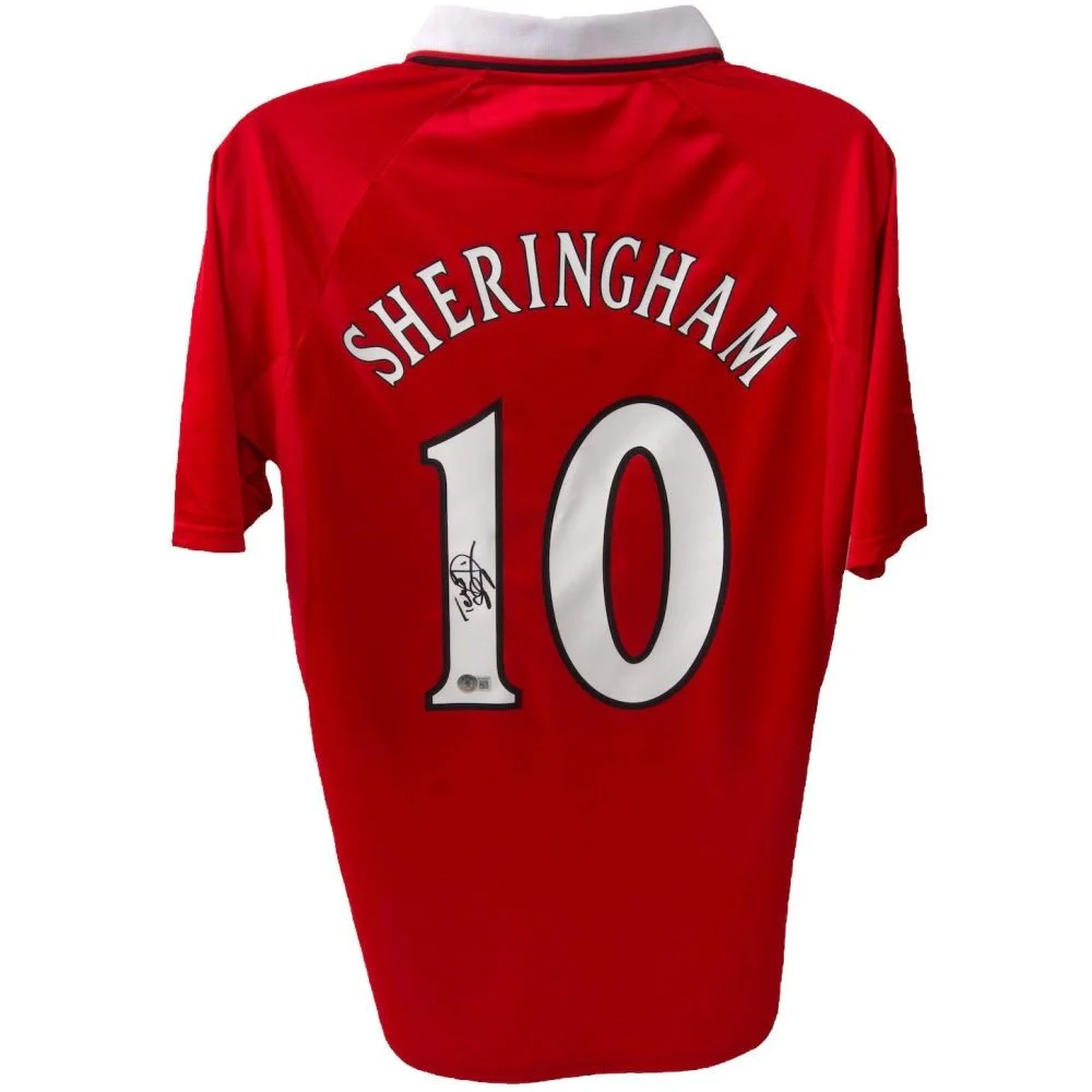 Red Manchester United jersey with SHERINGHAM 10 and Teddy Sheringham Umbro logo