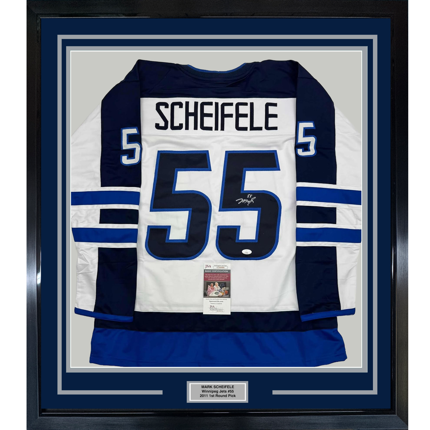 Framed Winnipeg Jets #55 white hockey jersey with "SCHEIFELE" nameplate and JSA authentication certificate mounted on blue matting.