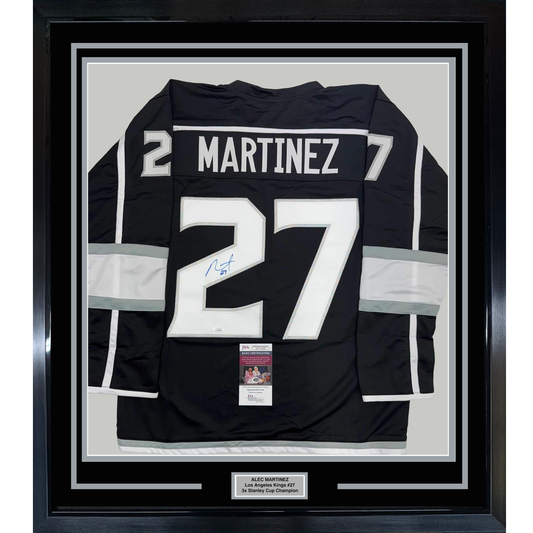 Framed Autographed/Signed Alec Martinez 35x39 Los Angeles LA Black Hockey Jersey JSA COA