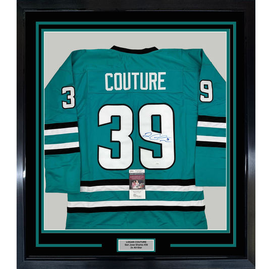 Framed rear view of teal San Jose Sharks jersey number 39 with "COUTURE" nameplate and signature, mounted in black frame with authentication label.
