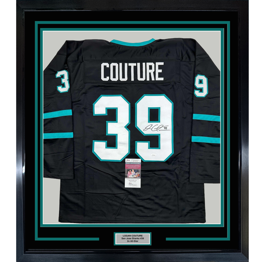 Black San Jose Sharks hockey jersey number 39 with "COUTURE" nameplate, signed, displayed framed with turquoise and black matting.