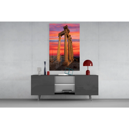 Vibrant sunset glass wall art with ancient stone columns in pink orange purple sky