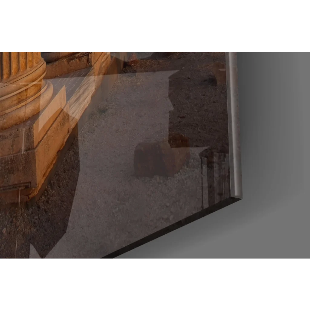 Framed glass wall art of ancient stone column ruins in golden sunset light