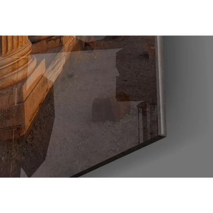 Framed glass wall art of ancient stone column ruins in golden sunset light
