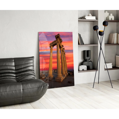 Vibrant sunset glass wall art with ancient columns in orange-pink-purple sky