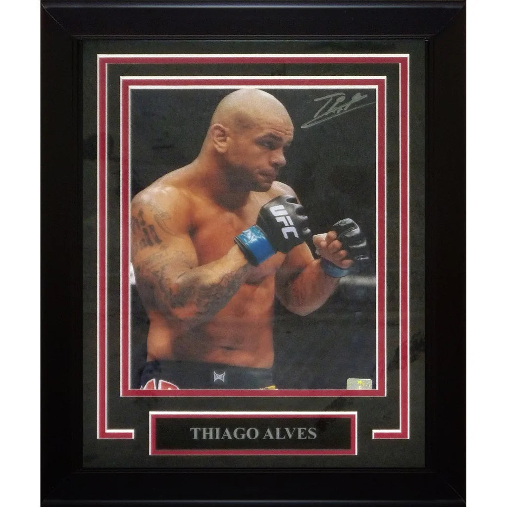 Black-framed deluxe framed 8x10 signed portrait of ufc fighter thiago alves wearing black and blue gloves