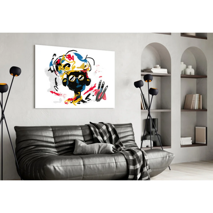 Vibrant black skull glass wall art with bold red, yellow, blue splashes