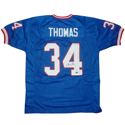 Thurman Thomas autographed custom blue jersey with name Thomas and number 34