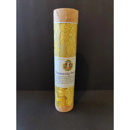 Tibetan handmade incense: golden-yellow Chenrezig sticks in ornate paper