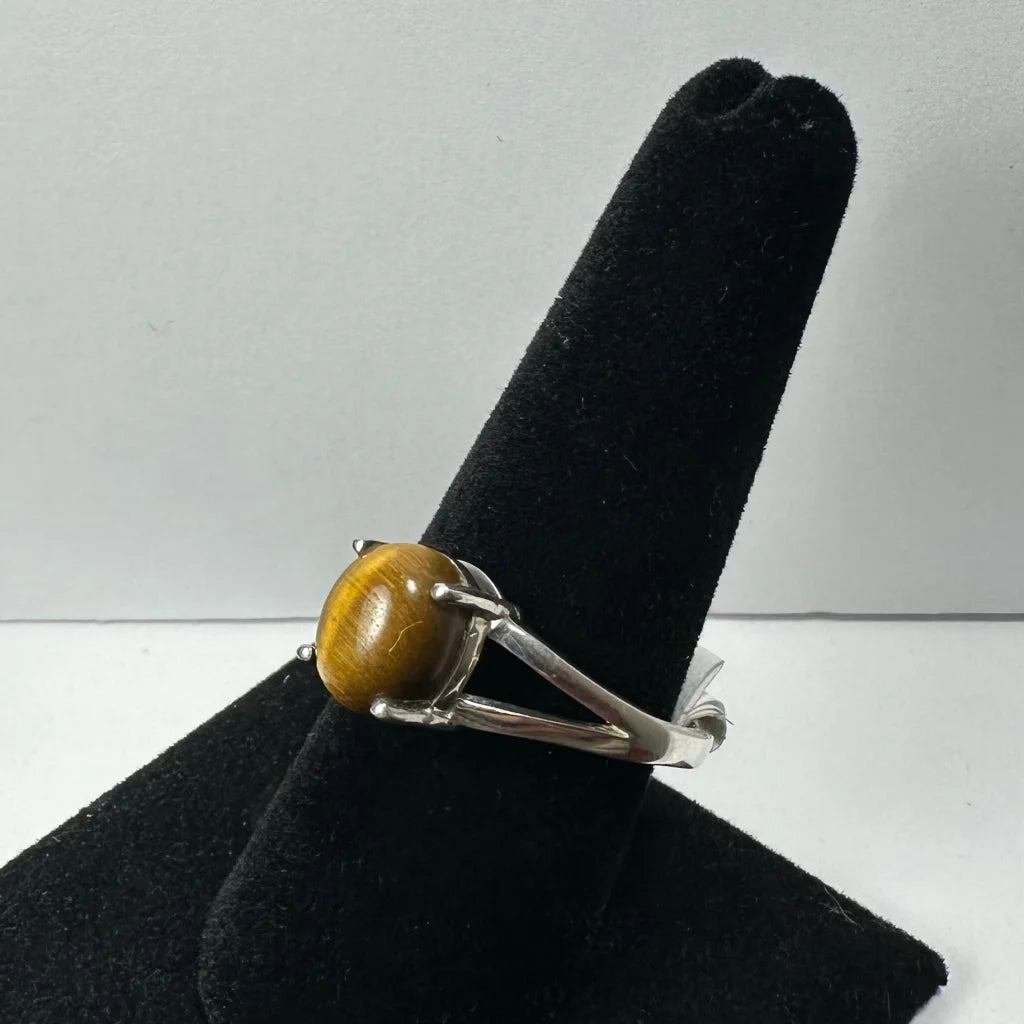 Silver tiger eye ring with oval stone in prong setting
